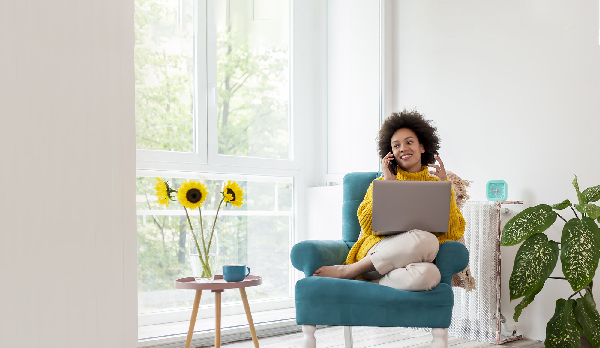 woman on phone on chair