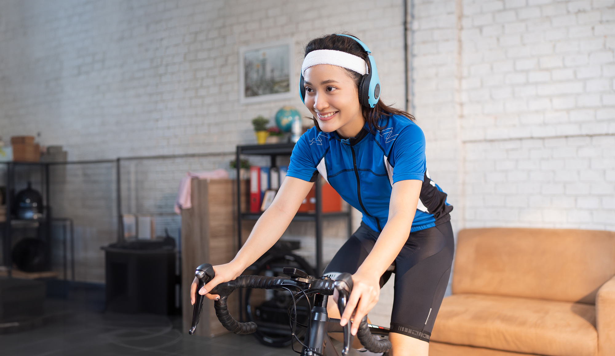 person on exercise bike