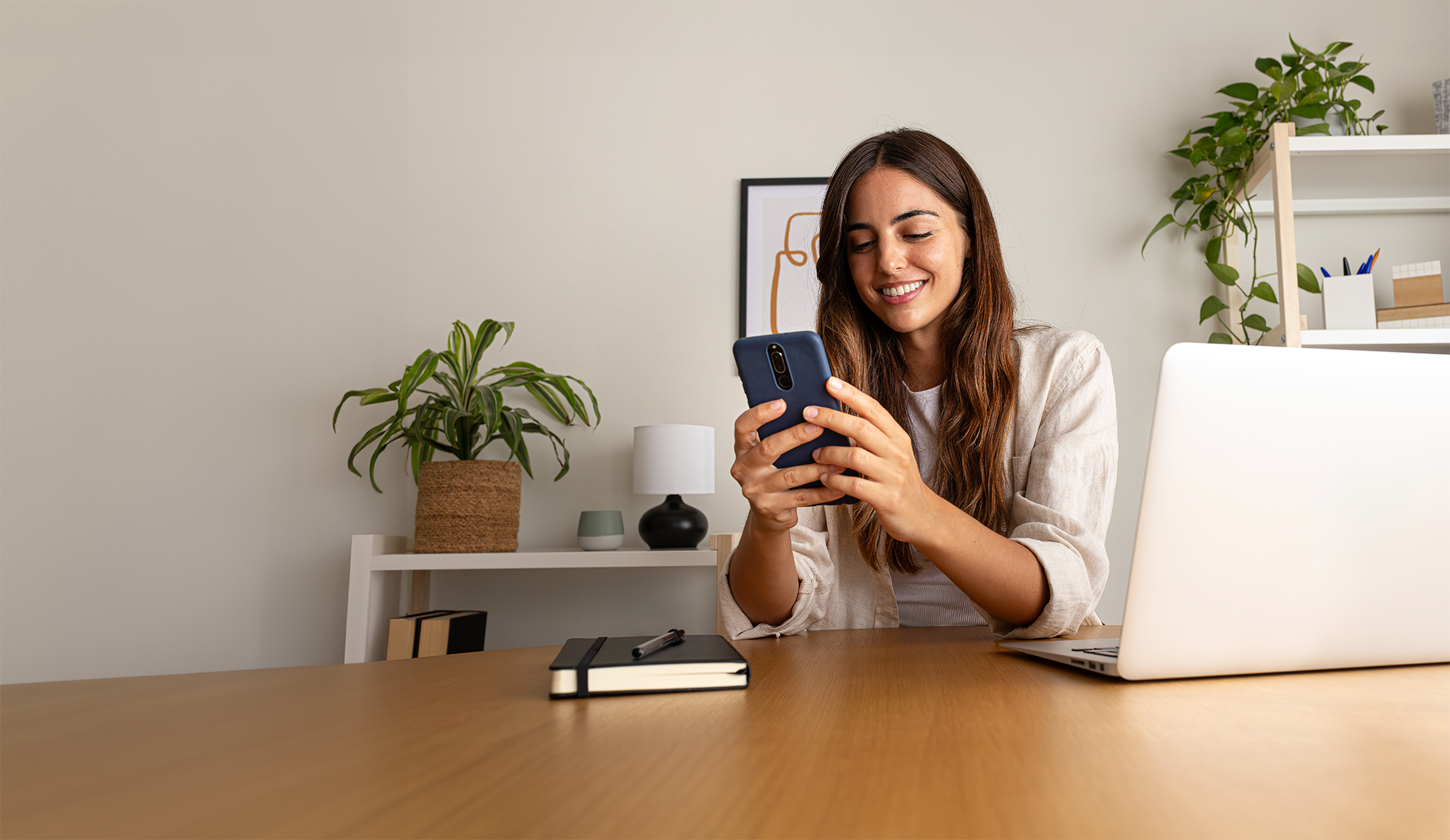 person on phone at desk