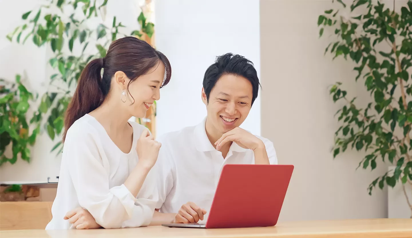 people looking at computer