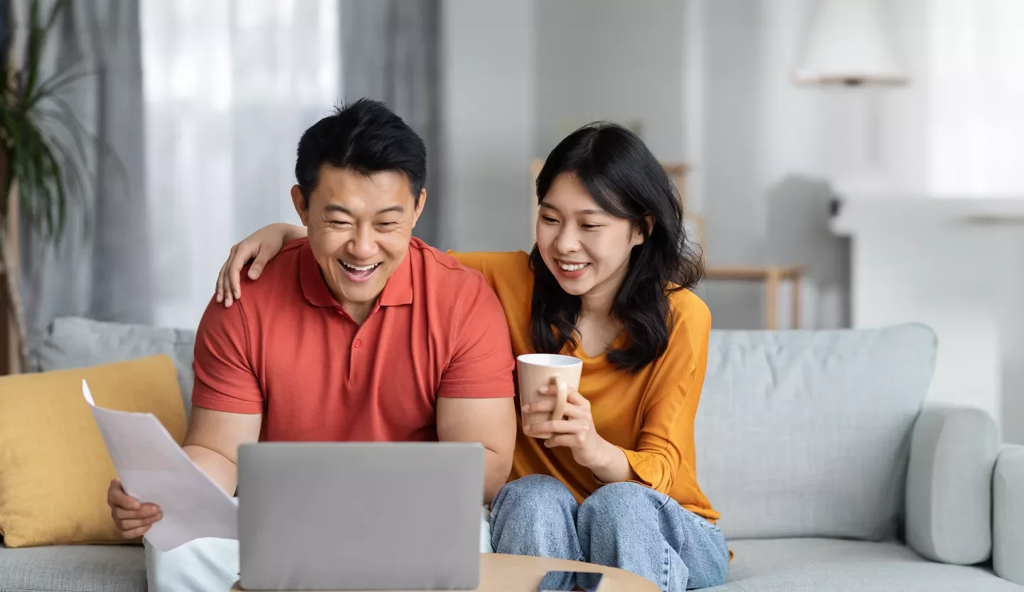 two people on laptop