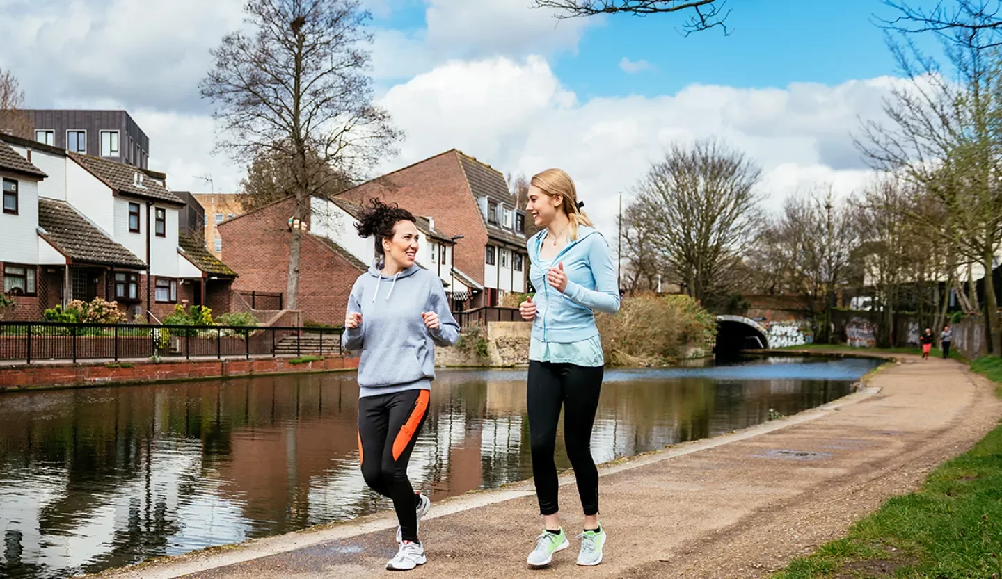 people jogging on trail