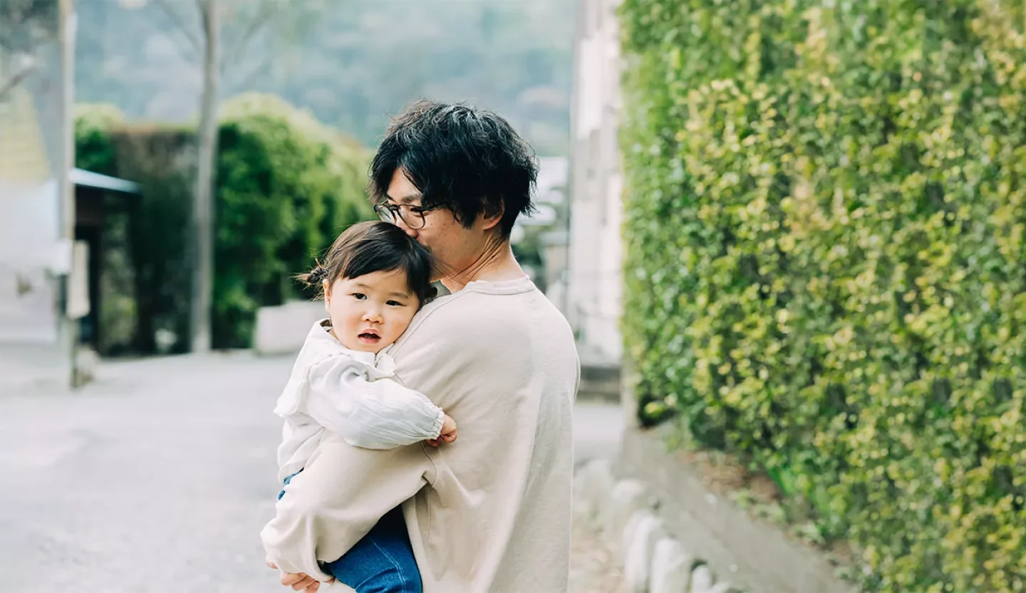 person with child outside